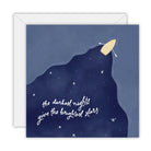 Square navy card with a small rowing boat on a starry river of night sky and the words the darkest nights give the brightest stars, on a white envelope