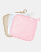 Three Toshi baby washcloths in pink, white and sand cotton towelling, each with a hanging loop