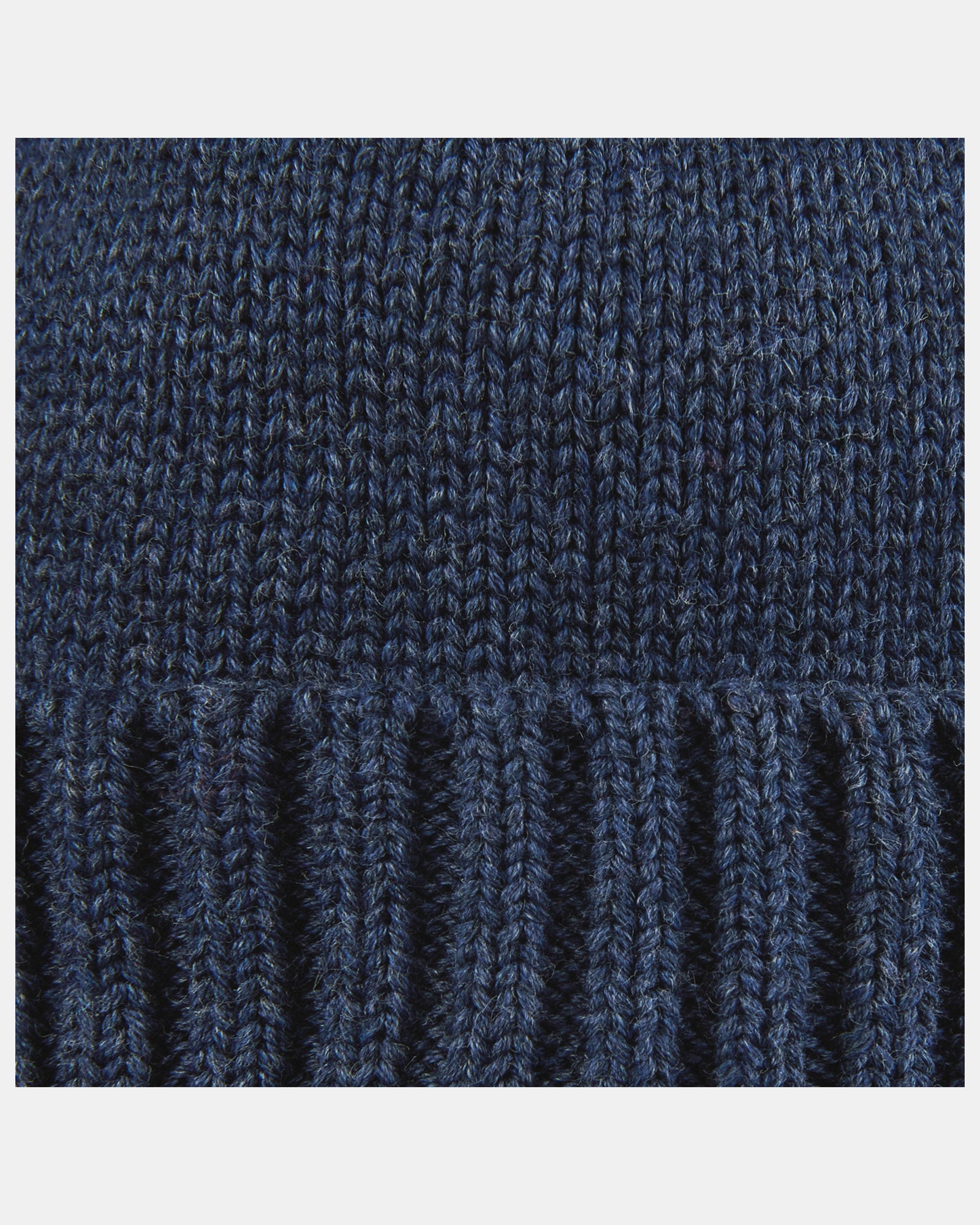 Close-up of the organic cotton melange knit and ribbed border of the Rover beanie