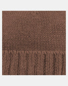Close-up of the peppercorn beanie's chunky organic cotton knit and ribbed border