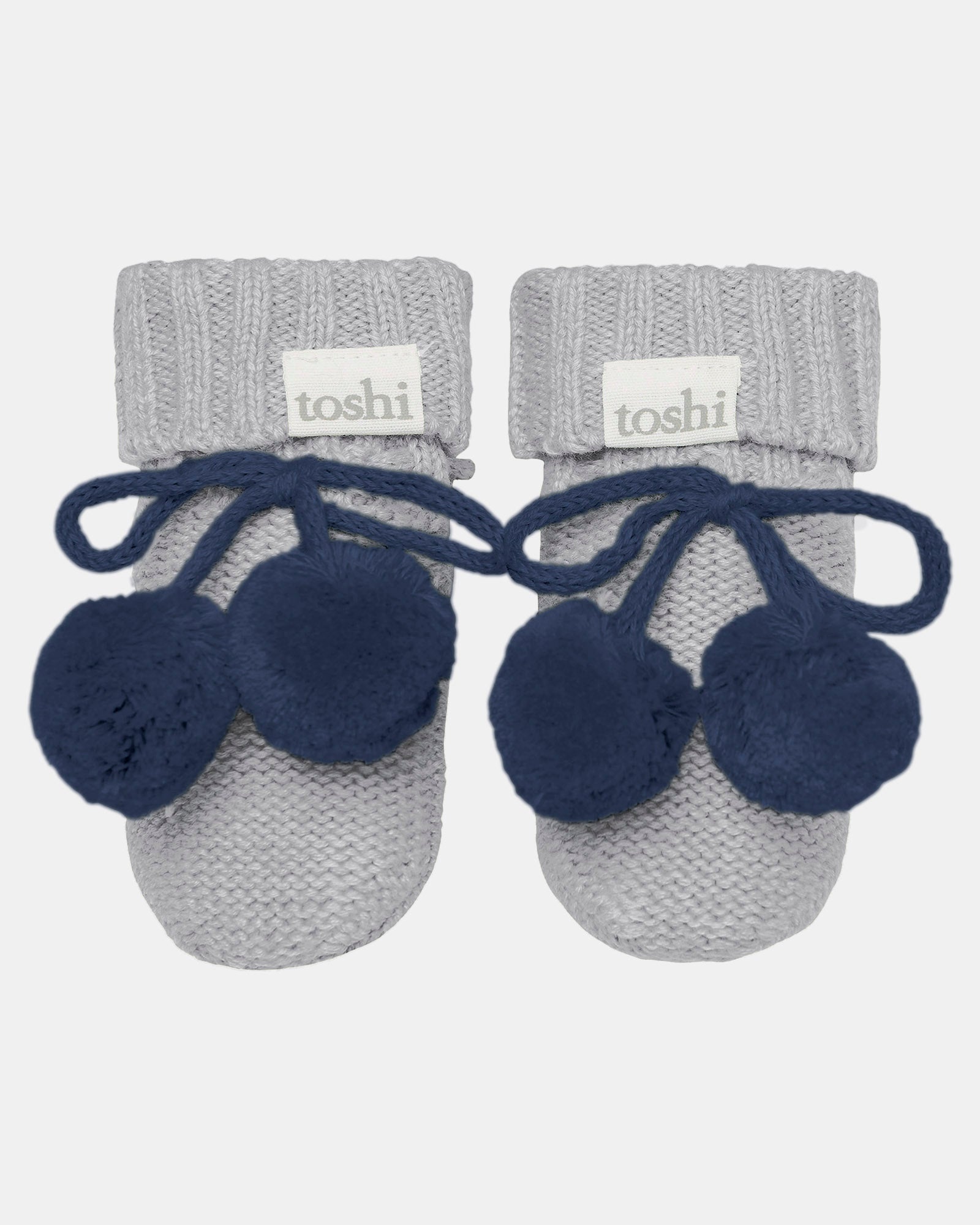 Toshi Organic Booties Bobby in pale grey knit with navy pompoms and tie fastening