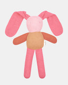 Toshi Bunny Bobby knitted comforter in misty rose — long floppy coral ears, a soft pink face with an embroidered smile, rust arms and pink legs