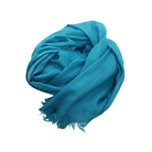 Beauty in Bamboo scarf in Turkish Blue, a rich turquoise teal, coiled loosely