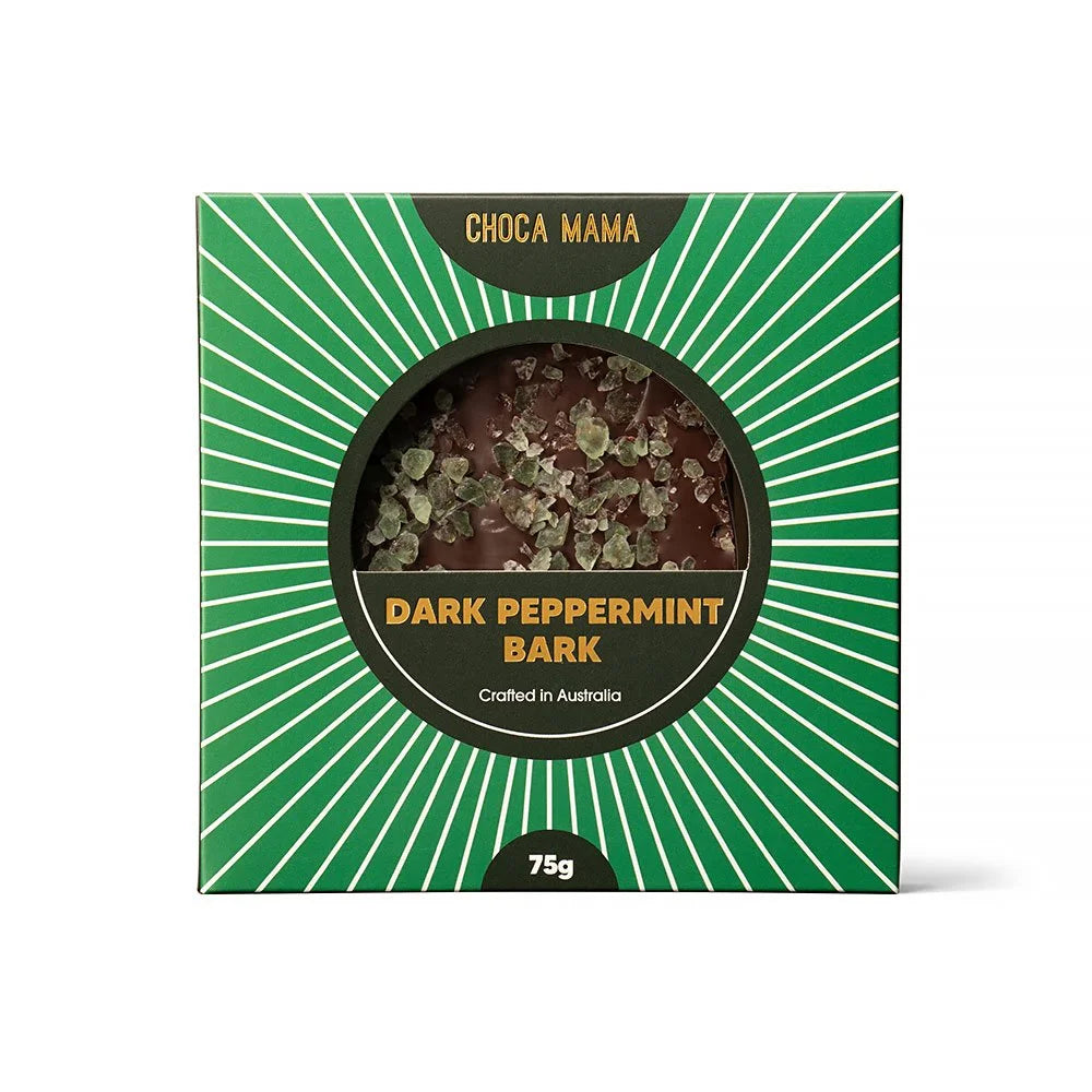 Front of the green sunburst dark peppermint bark box, the bark visible through the round window