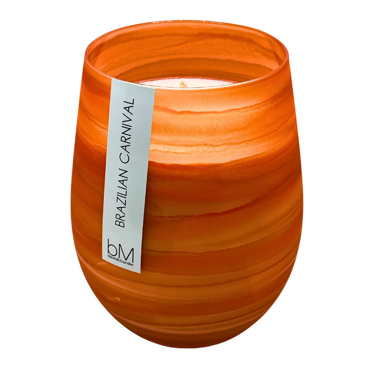 Wave Orange Brazilian Carnival soy candle in a rippled burnt-orange glass vessel with a single wick