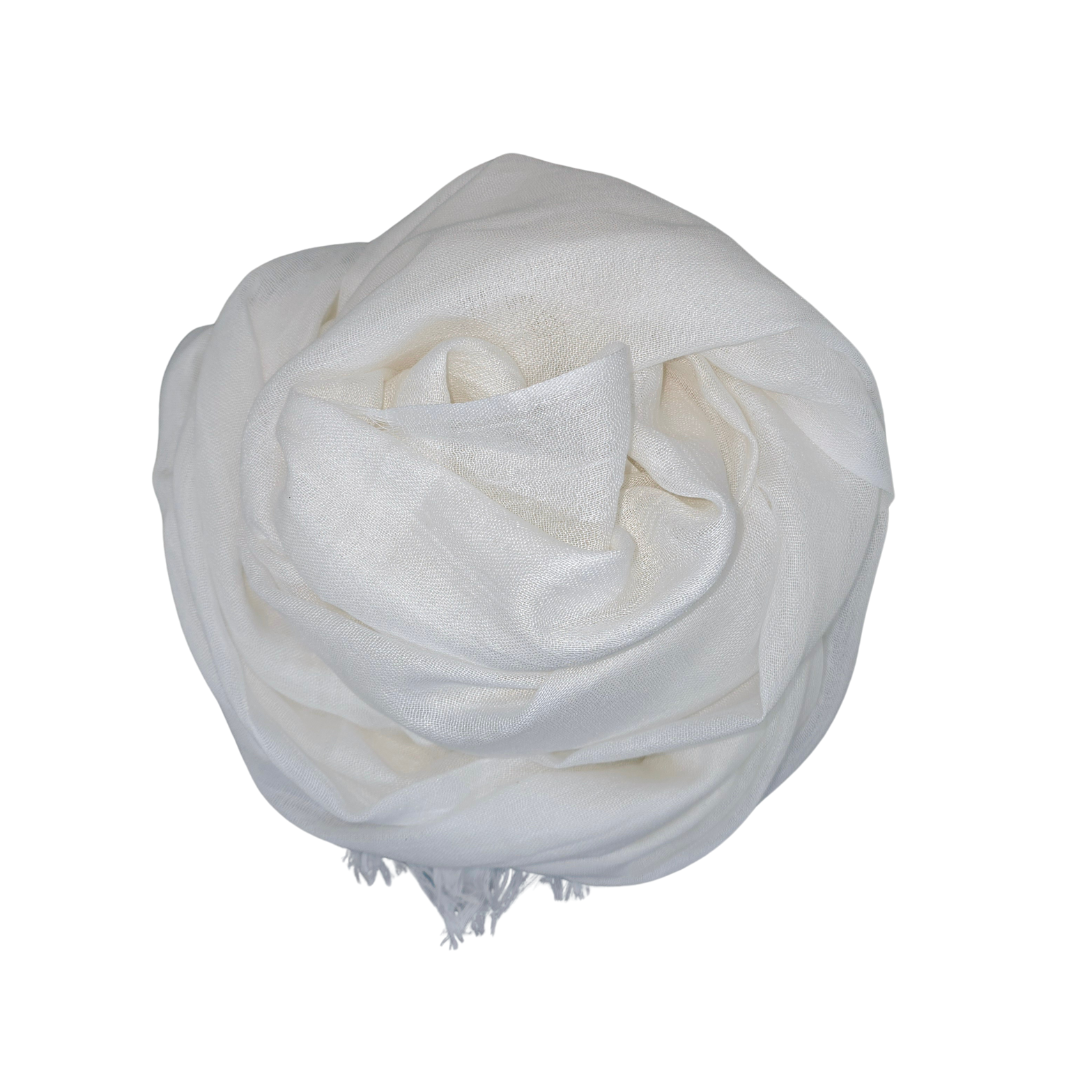 Beauty in Bamboo scarf in White Ice, rolled into a soft rosette