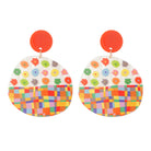 Drop earrings with an orange-red disc stud and a rounded panel printed with colourful flowers and checks