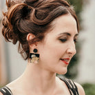 Allora earrings worn with an updo