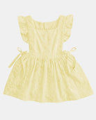 Toshi Florence pinafore in lemon embroidered cotton with frilled straps, a square neckline and bow ties at the sides