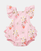 Toshi Strawberry Fields romper in pink cotton printed with strawberries and white blossoms, with frilled straps and two brown buttons