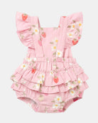 Back of the romper showing the straight straps, open back and rows of frills across the seat