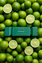 The Exhale bon bon on a pile of whole and halved limes.