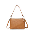 The back of the tan bag with the shoulder strap and the cross body strap attached.