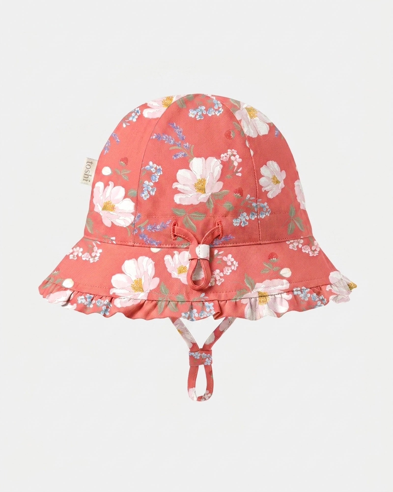 Toshi Arcadia Camille Paradise bell sunhat in coral pink cotton with a white blossom print, frilled brim, adjustable head toggle and chin strap