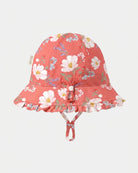 Toshi Arcadia Camille Paradise bell sunhat in coral pink cotton with a white blossom print, frilled brim, adjustable head toggle and chin strap