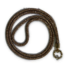 A crossbody phone lanyard coiled in a loop, the cord densely set with small rose gold sparkling stones, finished with a gold-tone clasp ring.