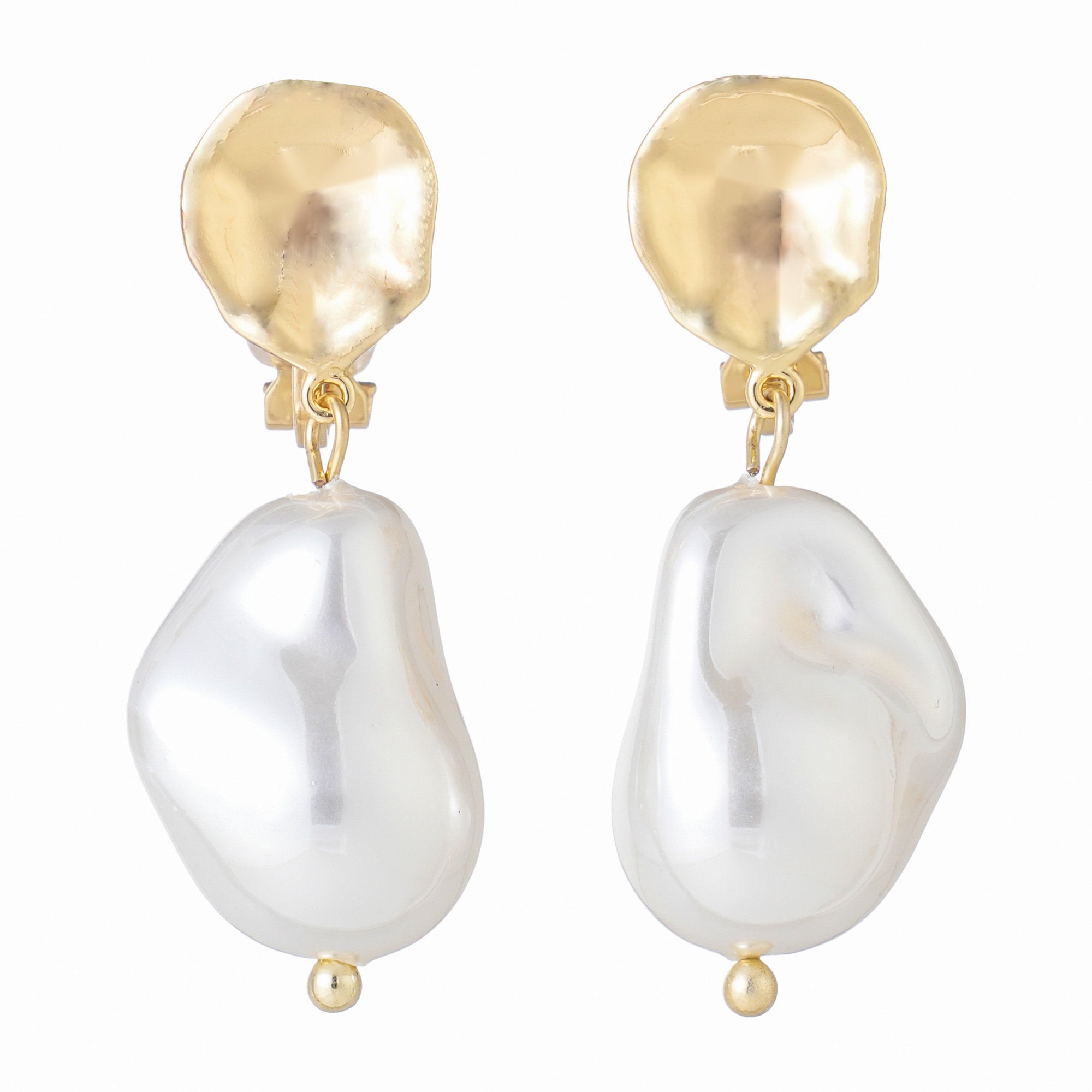 Gold-tone clip-on earrings with a hammered disc and baroque pearl drop