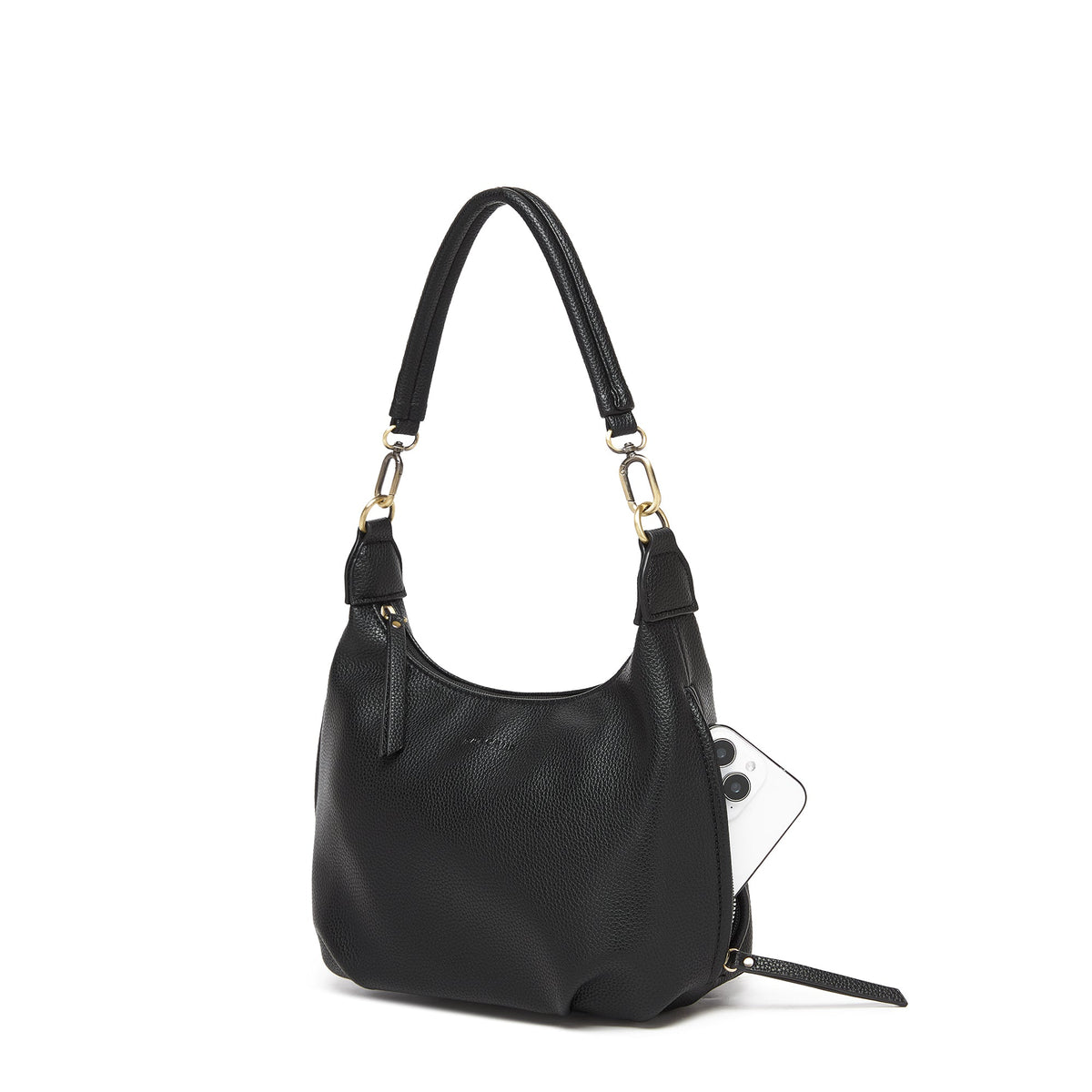 The black bag at an angle with a phone tucked into a side zip pocket.