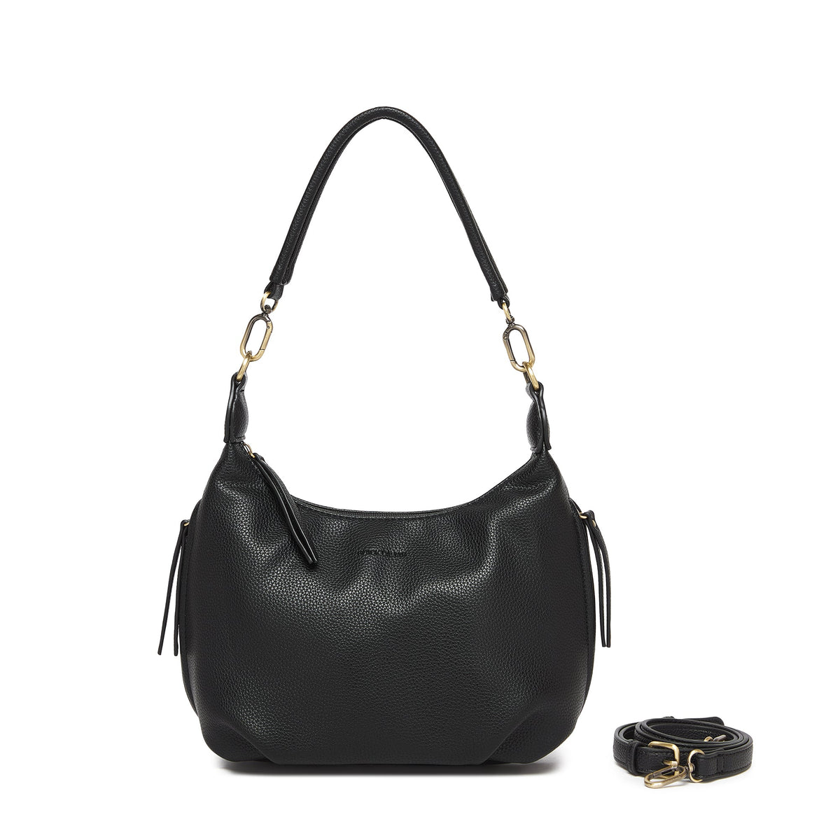The black bag on its shoulder strap, with the long black cross body strap coiled beside it.