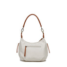The back of the white bag, with a zipped pocket and a long tan zip pull.