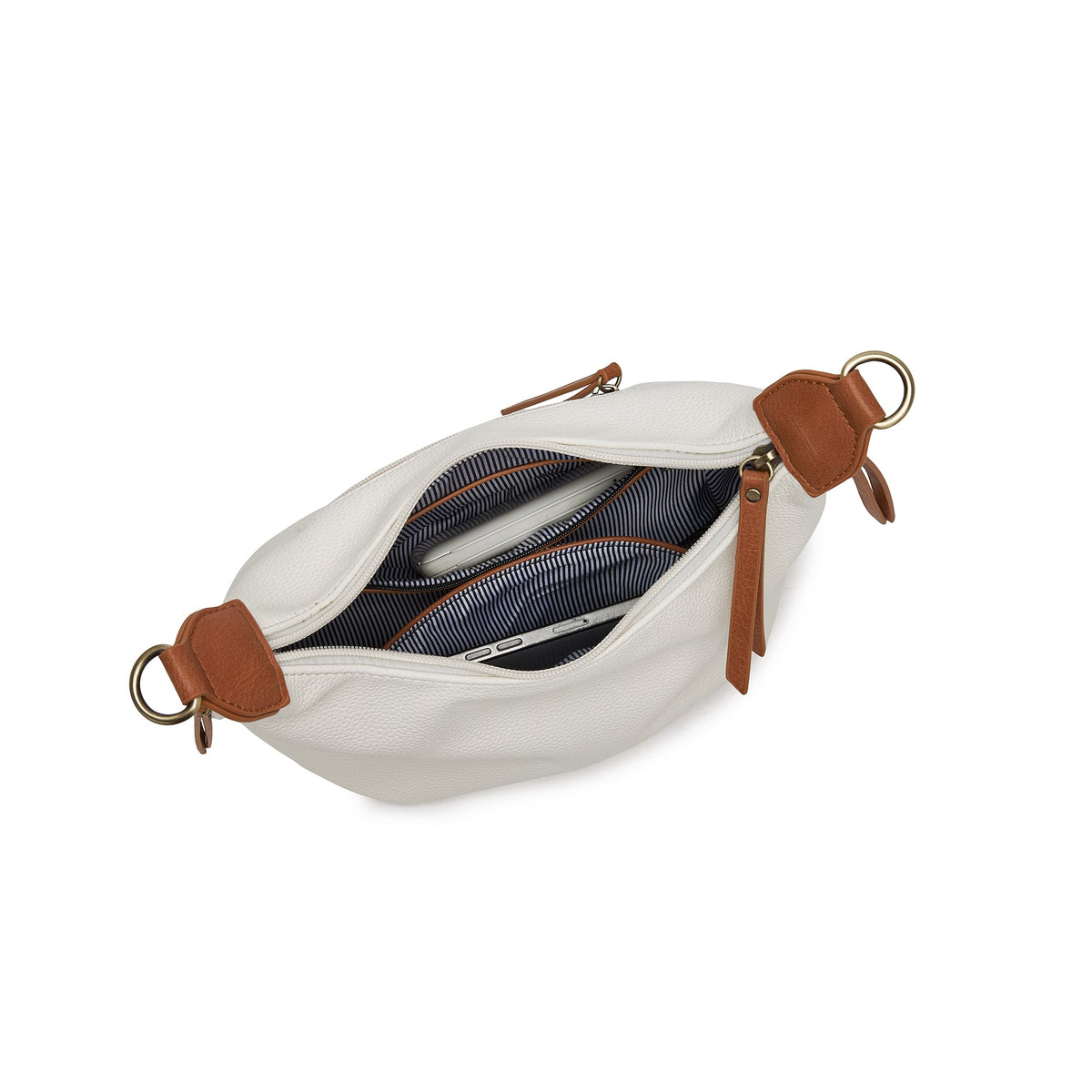 The open bag from above, with small items tucked into its inside pockets.