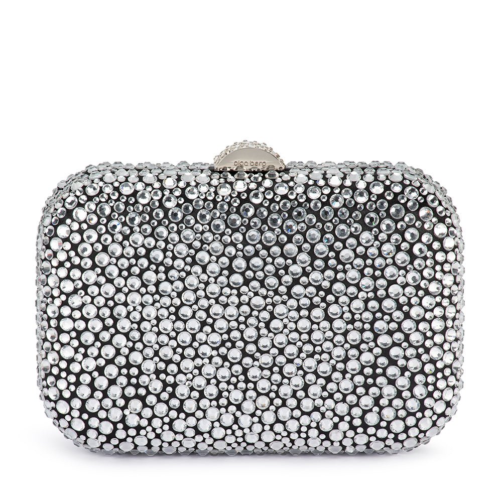 Black clutch covered in silver crystals from the front, a crystal-topped half-moon clasp