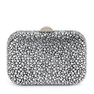 Black clutch covered in silver crystals from the front, a crystal-topped half-moon clasp