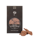 Black Chocamama box of milk chocolate coconut rough with a white palm tree and a round window, three roughs in front