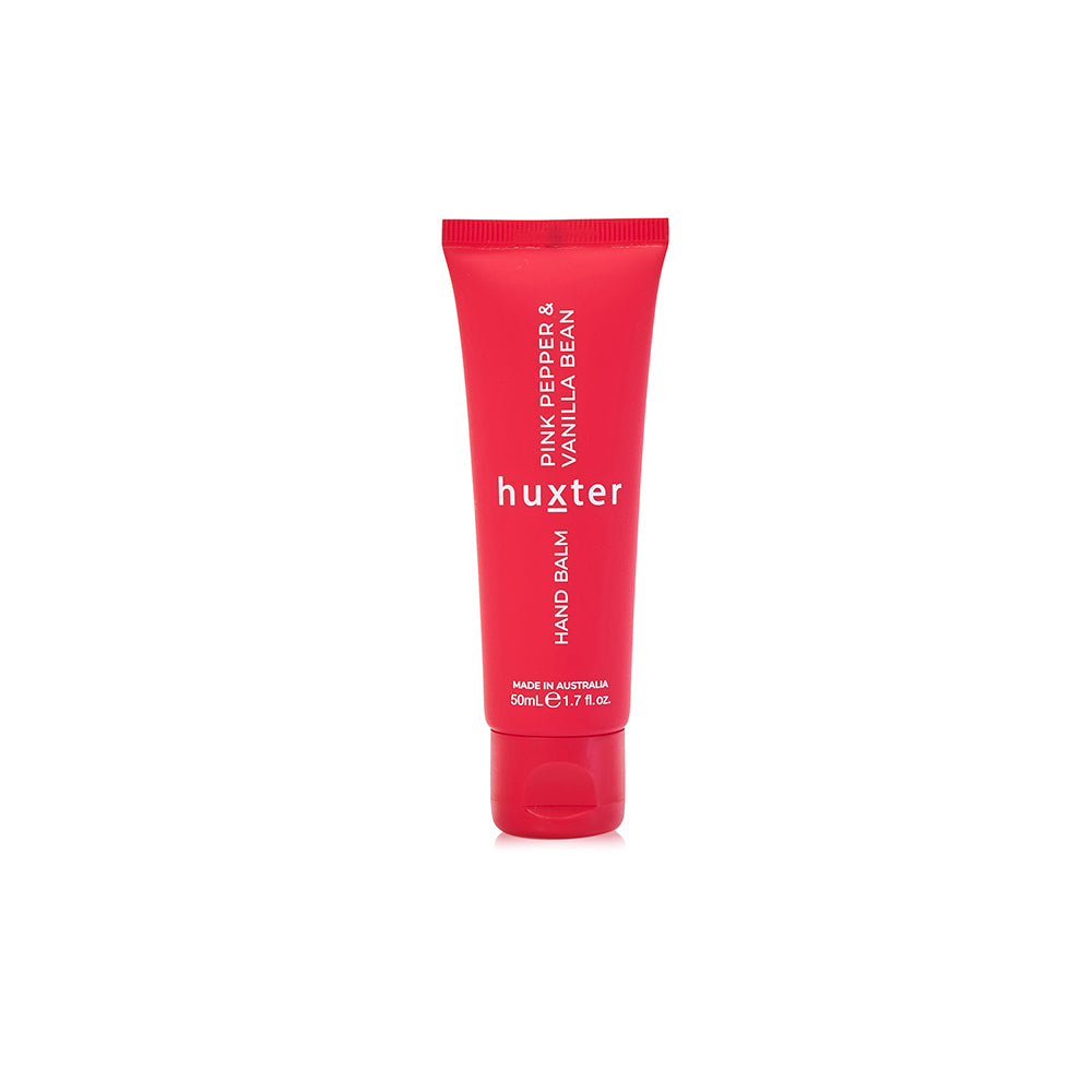 Red 50 mL Huxter hand balm tube, Pink Pepper & Vanilla Bean.