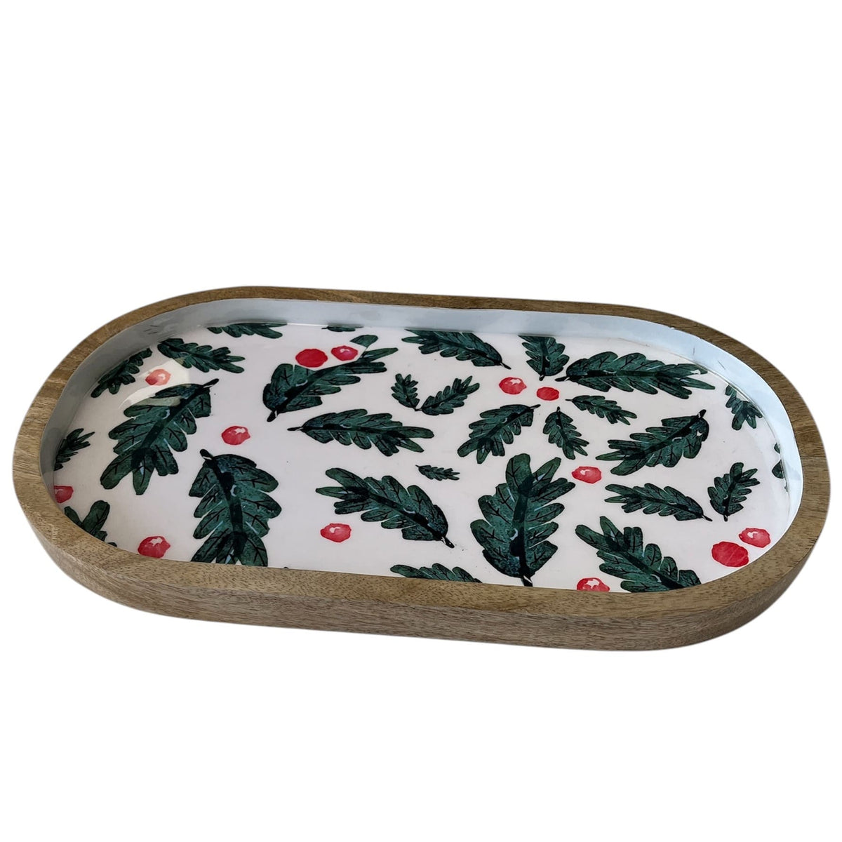 Christmas Foliage oval wooden serving tray with green leaves and red berries printed on a white face