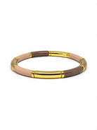 Bracelet of curved bars in taupe, khaki and blush with polished gold-tone sections