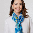 Dawn scarf in blue tied at the neck