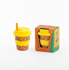 Dragons cup with the lid on beside its orange and green Chino Club gift box