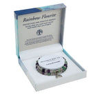 Two rainbow fluorite bead bracelets in purple, green and clear with silver spacers and a Tree of Life charm, in an open blue marble gift box