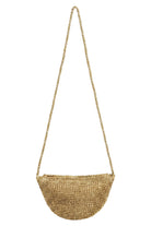 Gold metallic mesh Eden half-moon crossbody bag hanging from its long strap