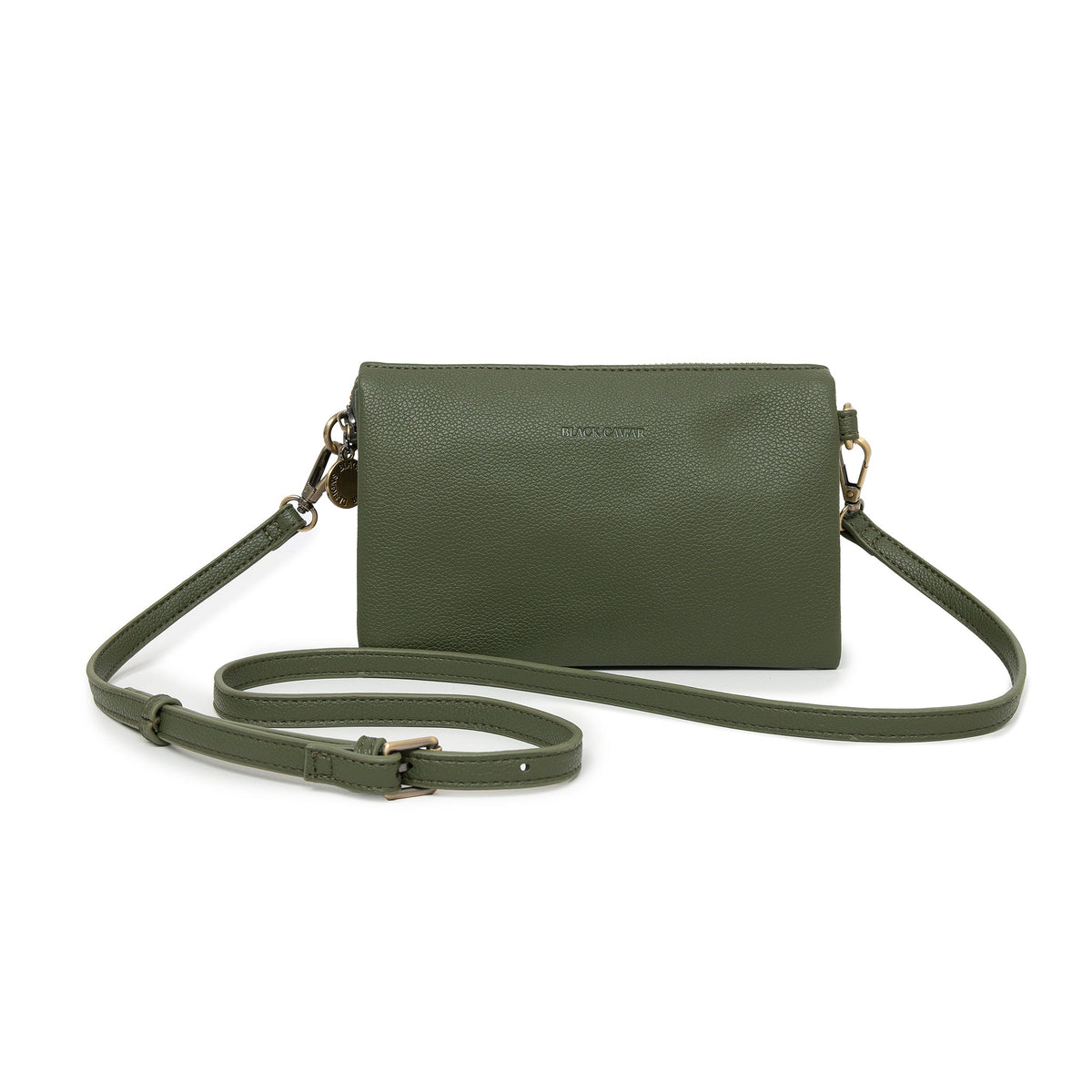 Dark olive cross body bag with gold-tone clips and a slim strap laid around it.