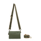 The olive bag on a wide olive cotton strap with tan edges.