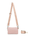 The pink bag on a wide pink and cream cotton strap.