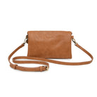 Tan cross body bag with gold-tone clips and a slim strap laid around it.