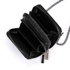 Both zip compartments open, card slots in the front one and a roomy rear pocket behind