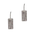 Pair of hammered rectangular drop earrings on fish hooks, silver with a small clear stone.