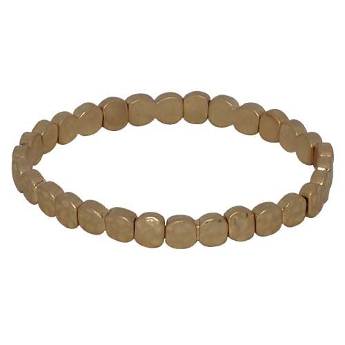 Stretch bracelet of small hammered gold discs.
