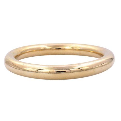 Thick, high-polish gold-tone round bangle.