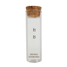 Selina sterling silver letter B stud earrings in a cork-topped glass gift tube.