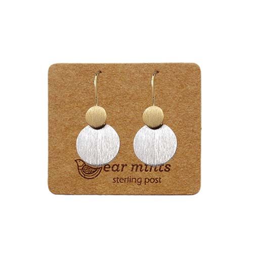 Pair of fish hook earrings, a small brushed gold-tone disc above a larger brushed silver-tone disc, on an Ear Mints card.
