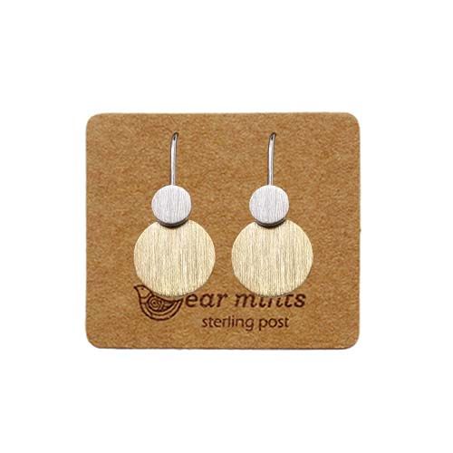 Pair of fish hook earrings, a small brushed silver-tone disc above a larger brushed gold-tone disc, on an Ear Mints card.