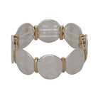 Stretch bracelet of large, gently hammered silver-tone discs joined by gold-tone bars.