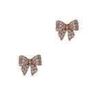 Pair of rose gold-tone bow stud earrings paved with clear cubic zirconia.