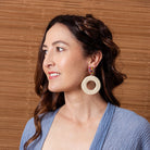 Faith earrings worn with a blue kimono