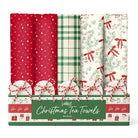 Festive Collection display box of folded Christmas tea towels in red bauble, green plaid and eucalyptus bow prints, each tied with red and white twine